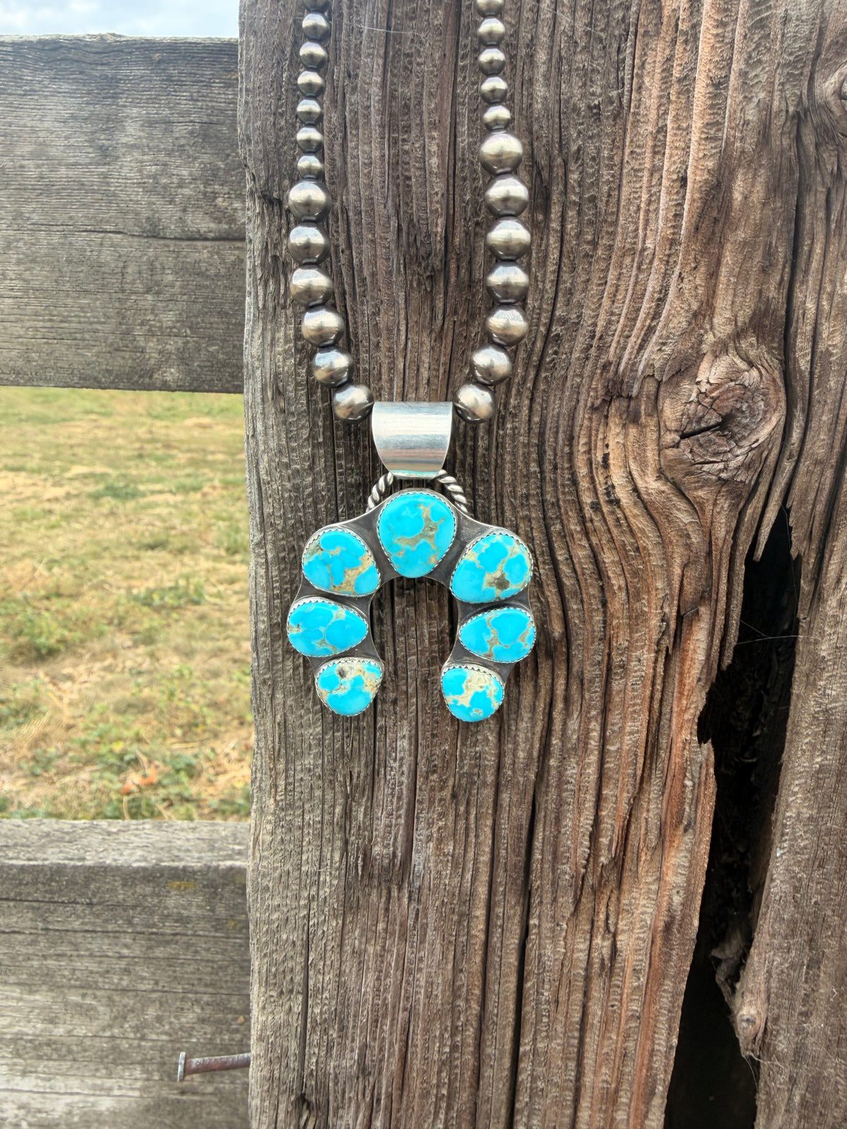 The Sierra squash blossom pendant
