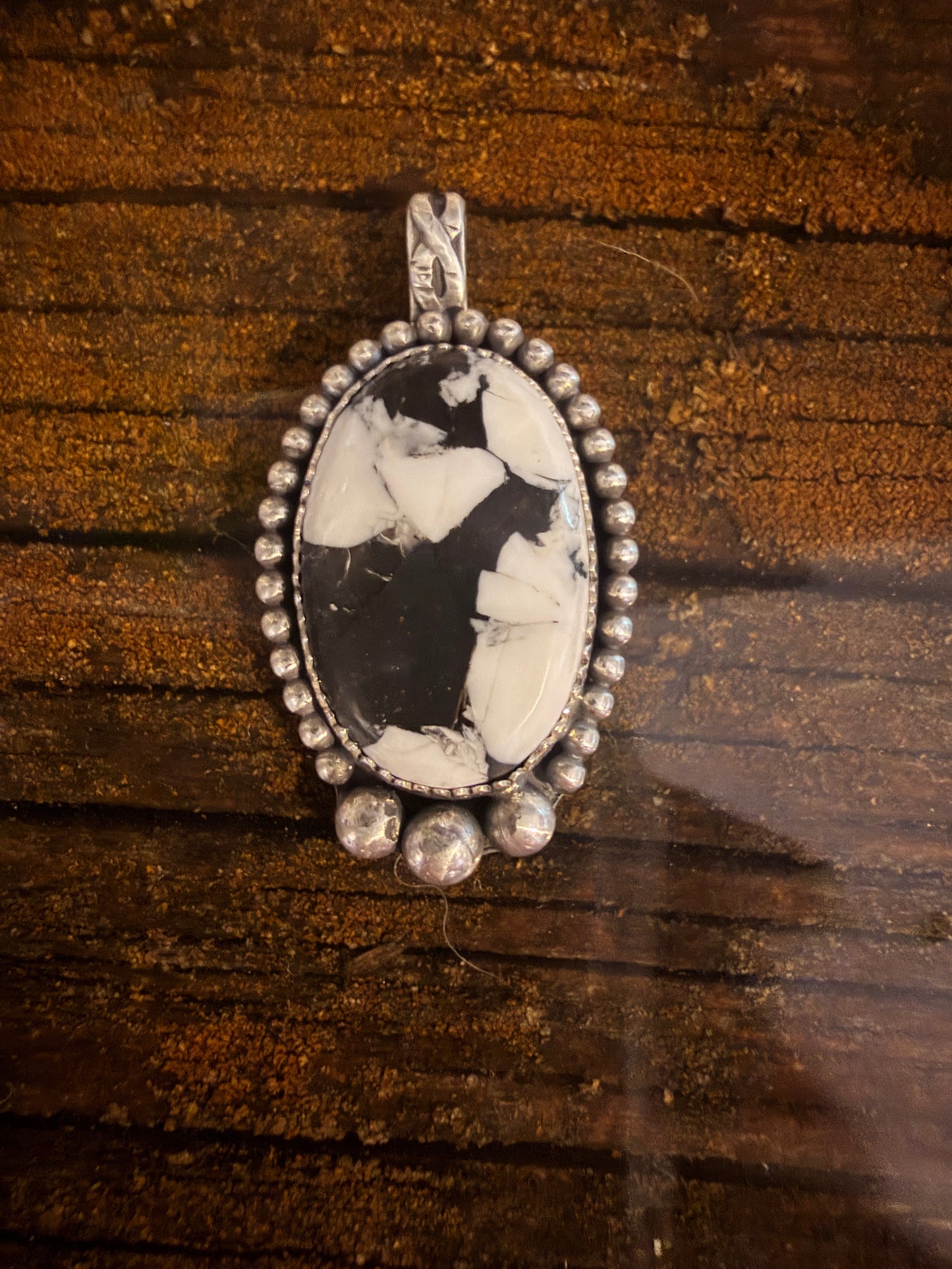 The white Buffalo pendant